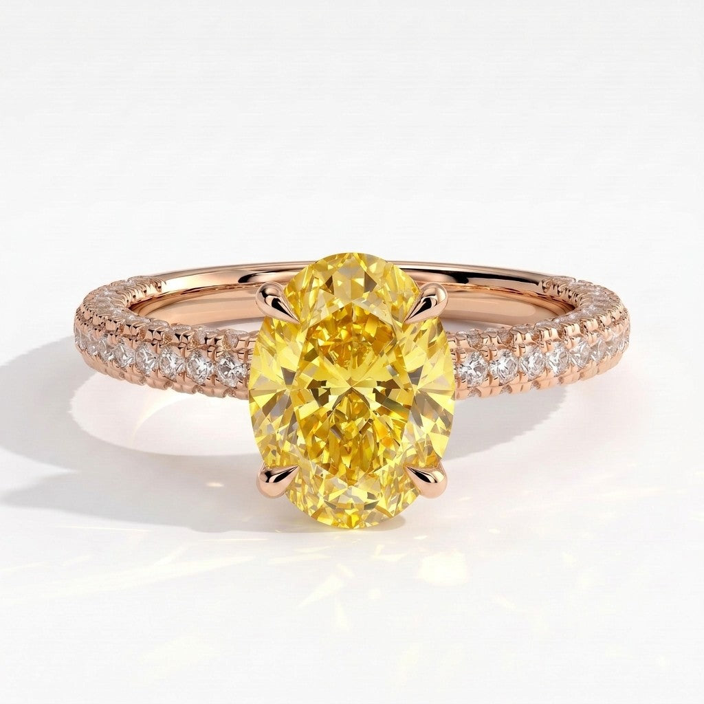 Fancy Vivid Yellow oval lab-grown diamond engagement ring with triple pavé band and hidden halo in 14K (585) rose gold, front view 