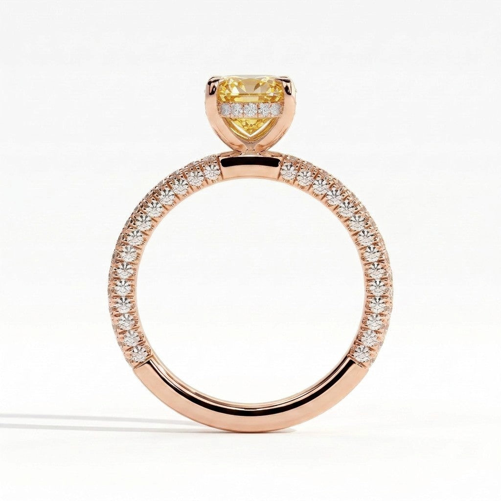Fancy Vivid Yellow oval lab-grown diamond engagement ring with triple pavé band and hidden halo in 18K (750) rose gold, side profile showing the hidden halo 