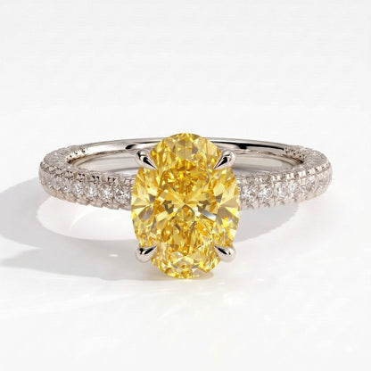 Fancy Vivid Yellow oval lab-grown diamond engagement ring with triple pavé band and hidden halo in 18K (750) white gold, front view 