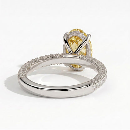 Fancy Vivid Yellow oval lab-grown diamond engagement ring with triple pavé band and hidden halo in 950 platinum, back view 