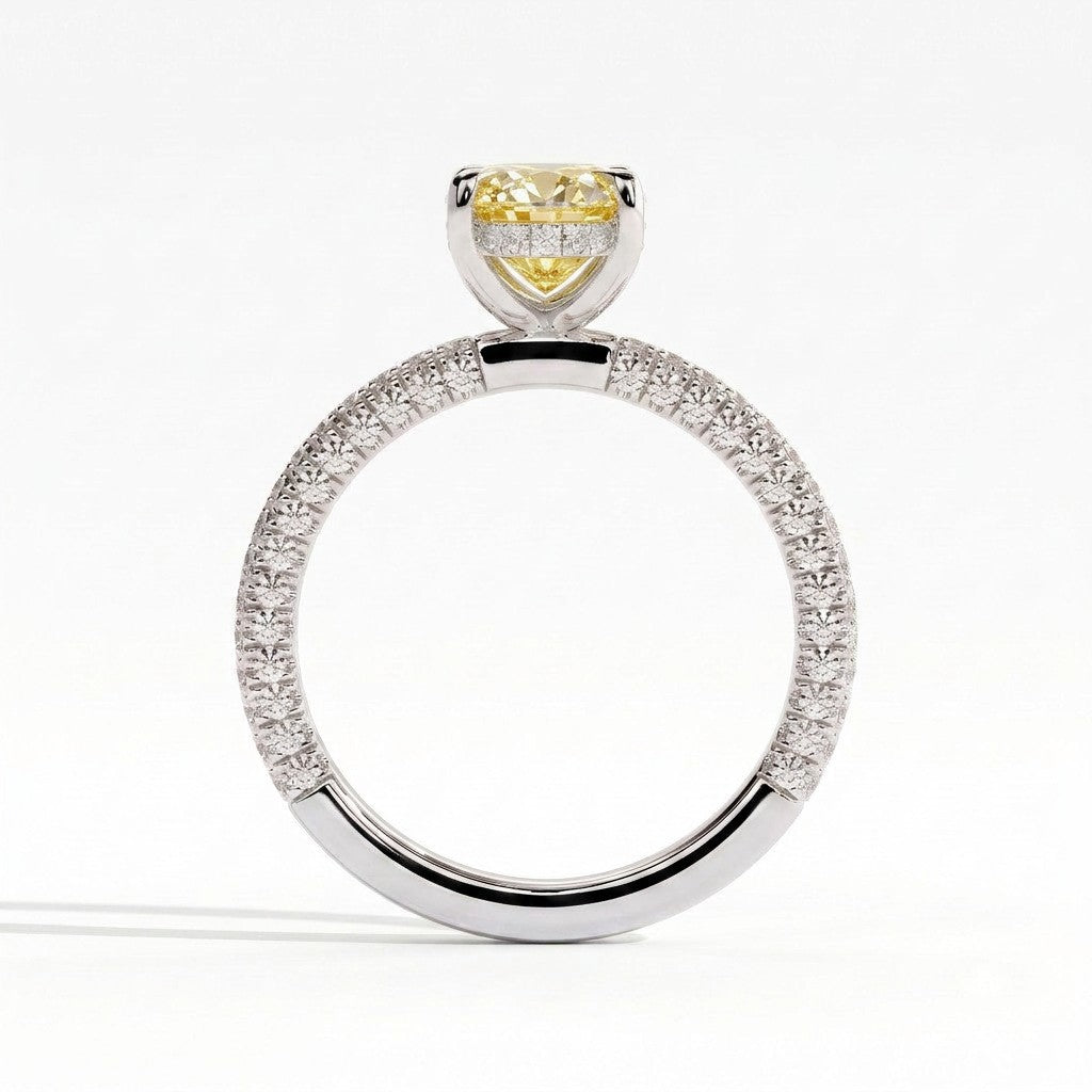 Fancy Vivid Yellow oval lab-grown diamond engagement ring with triple pavé band and hidden halo in 950 platinum, side profile showing the hidden halo 