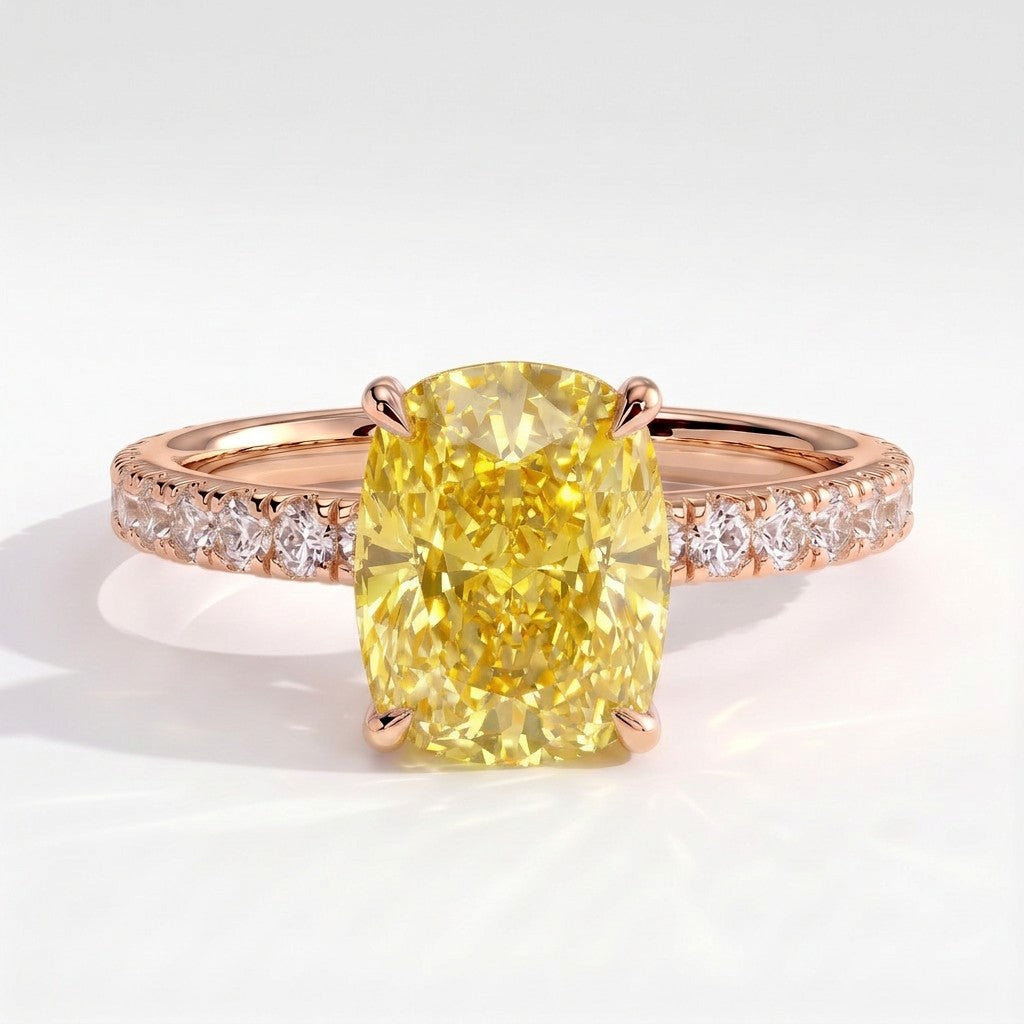 Fancy Vivid Yellow elongated cushion lab-grown diamond engagement ring with hidden halo and pavé band in 14K (585) rose gold, front view 