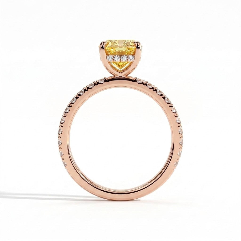 Fancy Vivid Yellow elongated cushion lab-grown diamond engagement ring with hidden halo and pavé band in 14K (585) rose gold, side profile showing the hidden halo 
