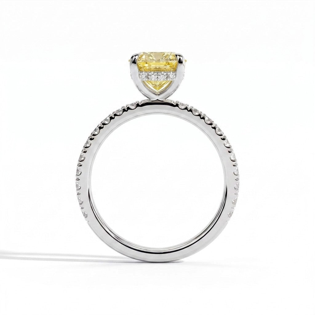 Fancy Vivid Yellow elongated cushion lab-grown diamond engagement ring with hidden halo and pavé band in 14K (585) white gold, side profile showing the hidden halo 