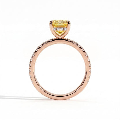 Fancy Vivid Yellow elongated cushion lab-grown diamond engagement ring with hidden halo and pavé band in 18K (750) rose gold, side profile showing the hidden halo 