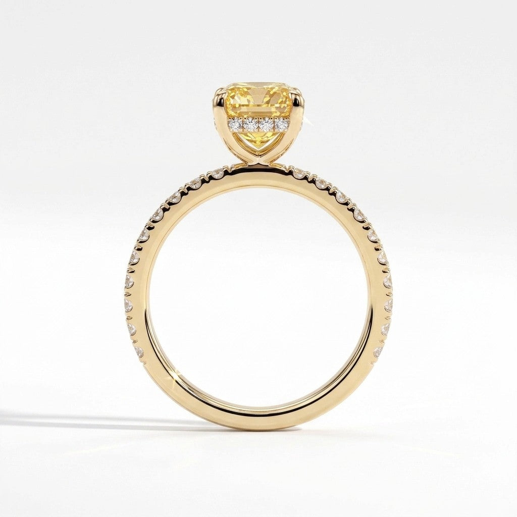 Fancy Vivid Yellow elongated cushion lab-grown diamond engagement ring with hidden halo and pavé band in 18K (750) yellow gold, side profile showing the hidden halo 