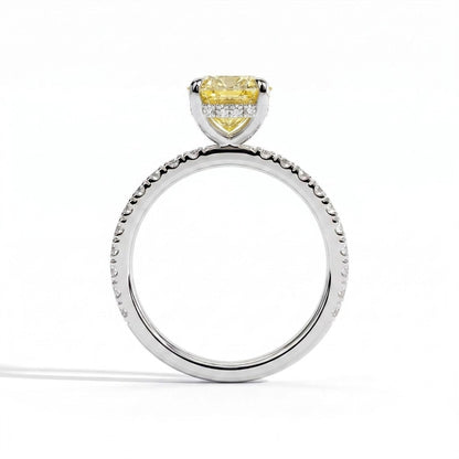 Fancy Vivid Yellow elongated cushion lab-grown diamond engagement ring with hidden halo and pavé band in 950 platinum, side profile showing the hidden halo 