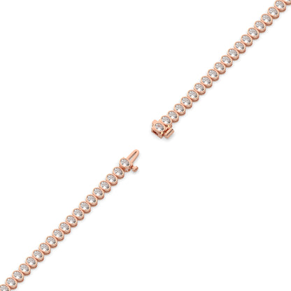 Magda Tennisarmband mit Labordiamanten im Ovalschliff mit Zargenfassung aus 585 Roségold, volle Länge, Diagonalansicht 
