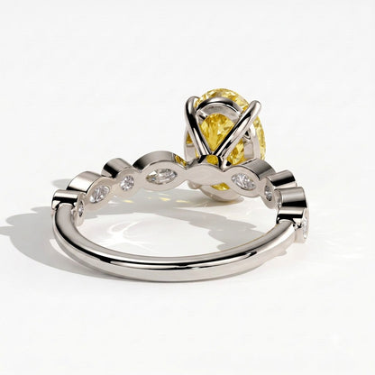 Fancy Vivid Yellow oval lab-grown diamond engagement ring with bezel-set pear and round shoulder accents in 14K (585) white gold, back view 