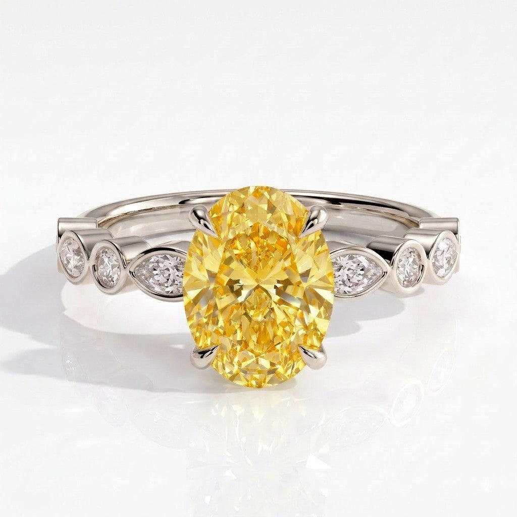 Fancy Vivid Yellow oval lab-grown diamond engagement ring with bezel-set pear and round shoulder accents in 18K (750) white gold, front view 