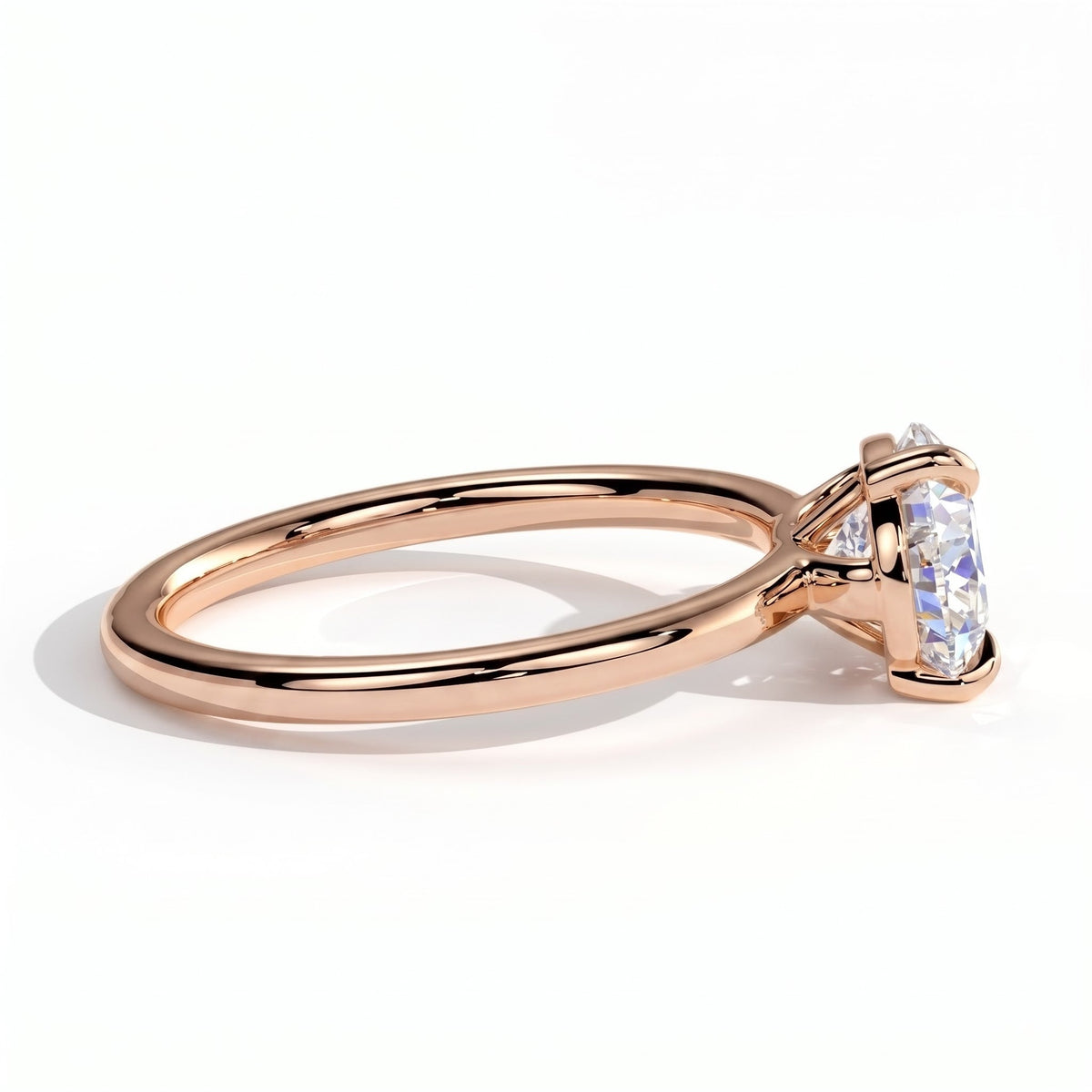 Pear lab-grown diamond east-west solitaire engagement ring in 14K (585) rose gold, detail view 