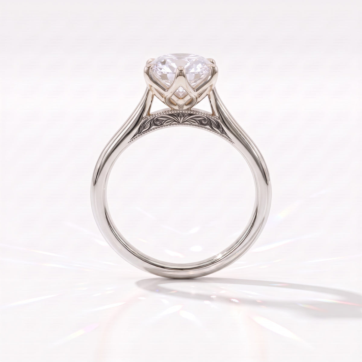 Antique cut oval lab-grown diamond vintage solitaire engagement ring with split shank and engraved gallery in 14K (585) white gold, profile view showing the engraved gallery 