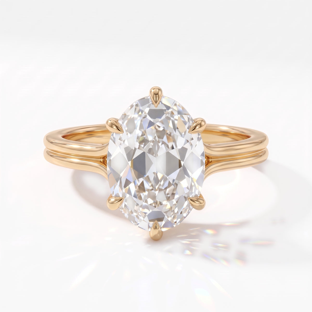 Antique cut oval lab-grown diamond vintage solitaire engagement ring with split shank and engraved gallery in 14K (585) yellow gold, front view 