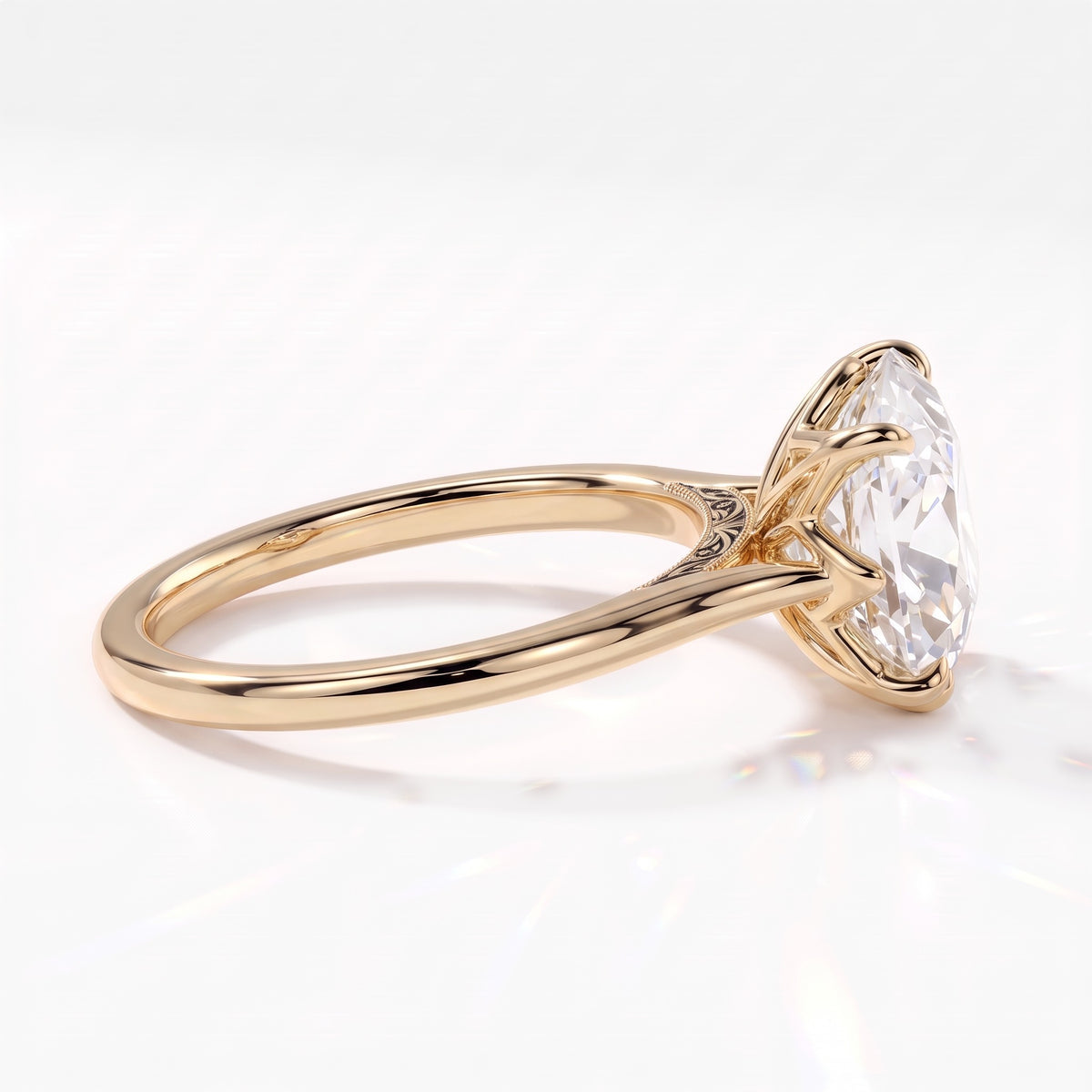 Antique cut oval lab-grown diamond vintage solitaire engagement ring with split shank and engraved gallery in 18K (750) yellow gold, side view showing the engraved gallery 