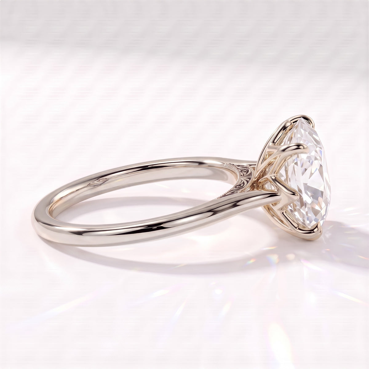 Antique cut oval lab-grown diamond vintage solitaire engagement ring with split shank and engraved gallery in 950 platinum, side view showing the engraved gallery 