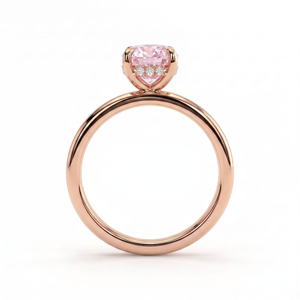 Fancy Vivid Pink elongated cushion lab-grown diamond engagement ring with flat cigar band and hidden halo in 14K (585) rose gold, side profile showing the hidden halo 