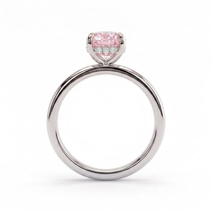 Fancy Vivid Pink elongated cushion lab-grown diamond engagement ring with flat cigar band and hidden halo in 14K (585) white gold, side profile showing the hidden halo 