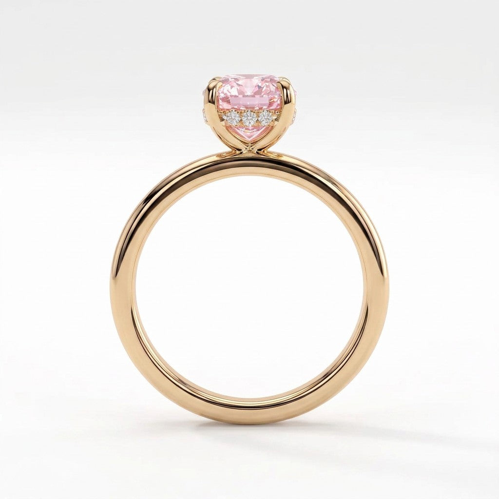 Fancy Vivid Pink elongated cushion lab-grown diamond engagement ring with flat cigar band and hidden halo in 14K (585) yellow gold, side profile showing the hidden halo 