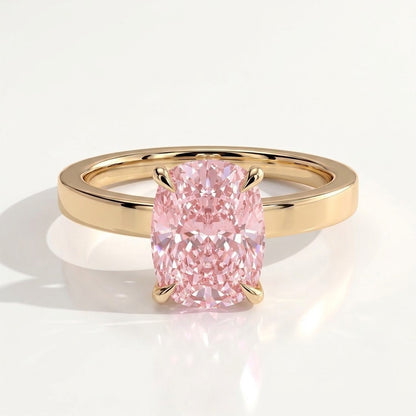 Fancy Vivid Pink elongated cushion lab-grown diamond engagement ring with flat cigar band and hidden halo in 18K (750) yellow gold, front view 