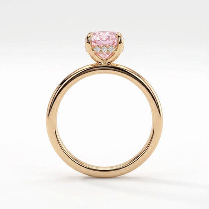 Fancy Vivid Pink elongated cushion lab-grown diamond engagement ring with flat cigar band and hidden halo in 18K (750) yellow gold, side profile showing the hidden halo 