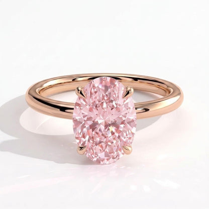 Fancy Vivid Pink oval lab-grown diamond engagement ring with wrap-around hidden halo in 14K (585) rose gold, front view 