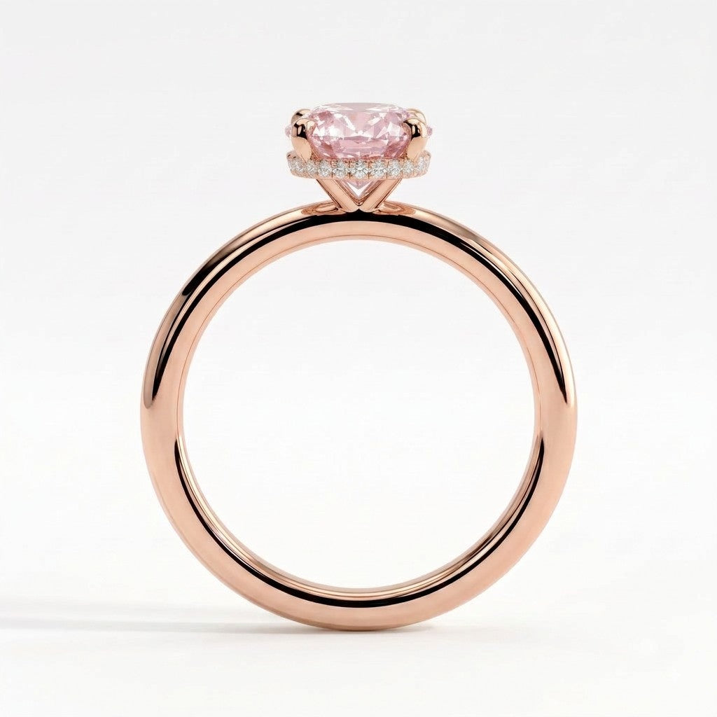 Fancy Vivid Pink oval lab-grown diamond engagement ring with wrap-around hidden halo in 14K (585) rose gold, side profile showing the hidden halo 