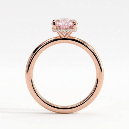 Fancy Vivid Pink oval lab-grown diamond engagement ring with wrap-around hidden halo in 14K (585) rose gold, side profile showing the hidden halo 