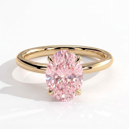 Fancy Vivid Pink oval lab-grown diamond engagement ring with wrap-around hidden halo in 14K (585) yellow gold, front view 