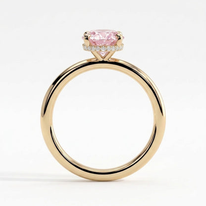 Fancy Vivid Pink oval lab-grown diamond engagement ring with wrap-around hidden halo in 14K (585) yellow gold, side profile showing the hidden halo 