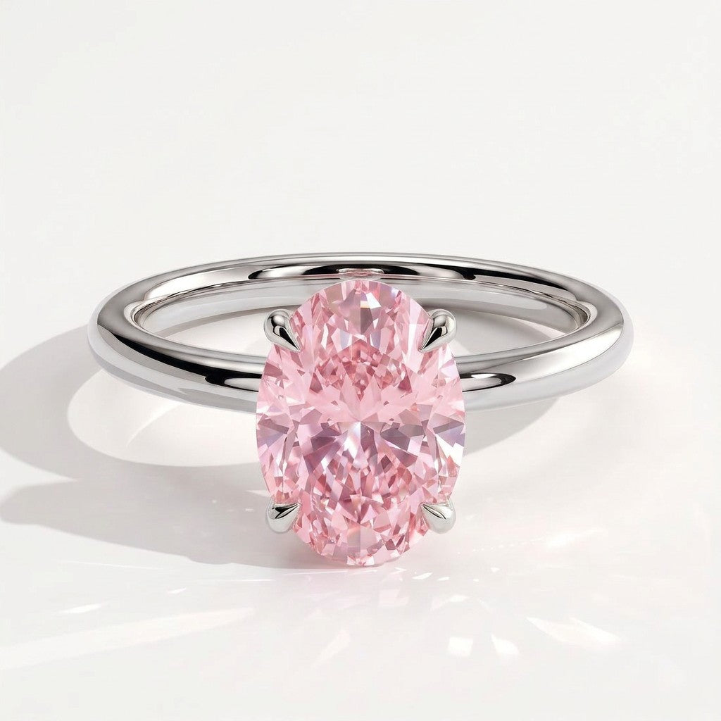 Fancy Vivid Pink oval lab-grown diamond engagement ring with wrap-around hidden halo in 18K (750) white gold, front view 