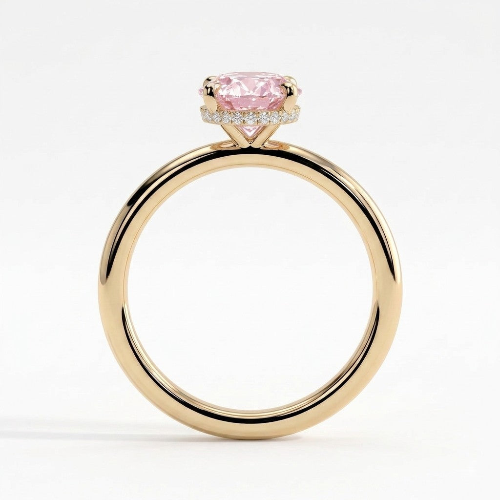 Fancy Vivid Pink oval lab-grown diamond engagement ring with wrap-around hidden halo in 18K (750) yellow gold, side profile showing the hidden halo 