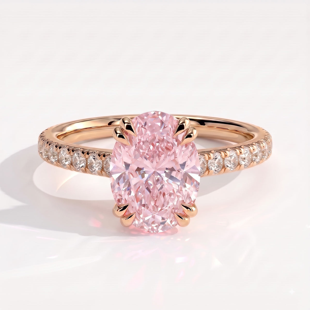 Fancy Vivid Pink oval lab-grown diamond double claw engagement ring with pavé band and hidden halo in 14K (585) rose gold, front view 
