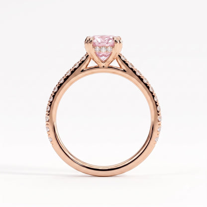 Fancy Vivid Pink oval lab-grown diamond double claw engagement ring with pavé band and hidden halo in 14K (585) rose gold, side profile showing the cathedral setting 