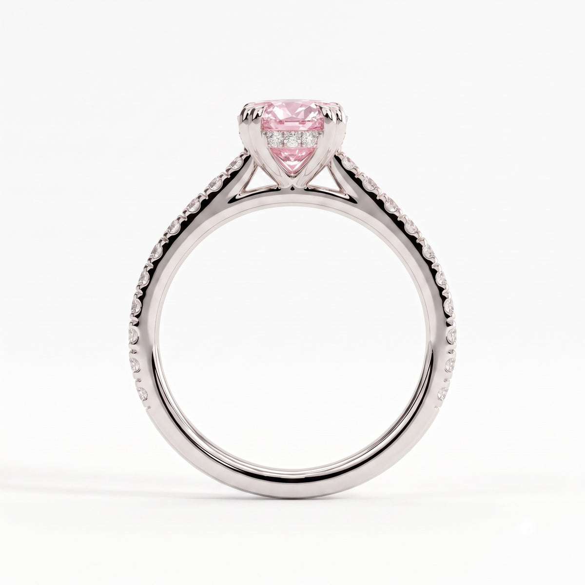 Fancy Vivid Pink oval lab-grown diamond double claw engagement ring with pavé band and hidden halo in 14K (585) white gold, side profile showing the cathedral setting 