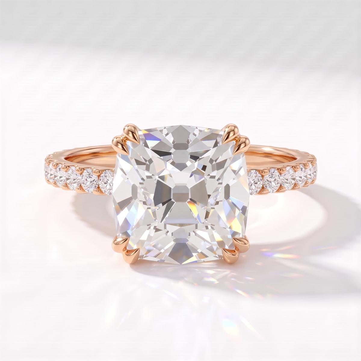Old mine cushion lab-grown diamond vintage solitaire engagement ring with pavé band in 14K (585) rose gold, front view 