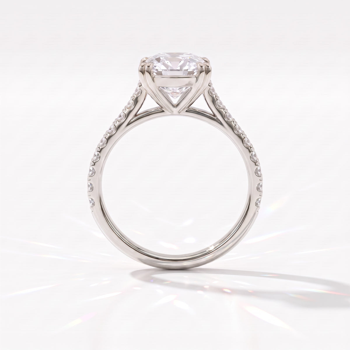 Old mine cushion lab-grown diamond vintage solitaire engagement ring with pavé band in 14K (585) white gold, profile view showing the double-claw gallery 