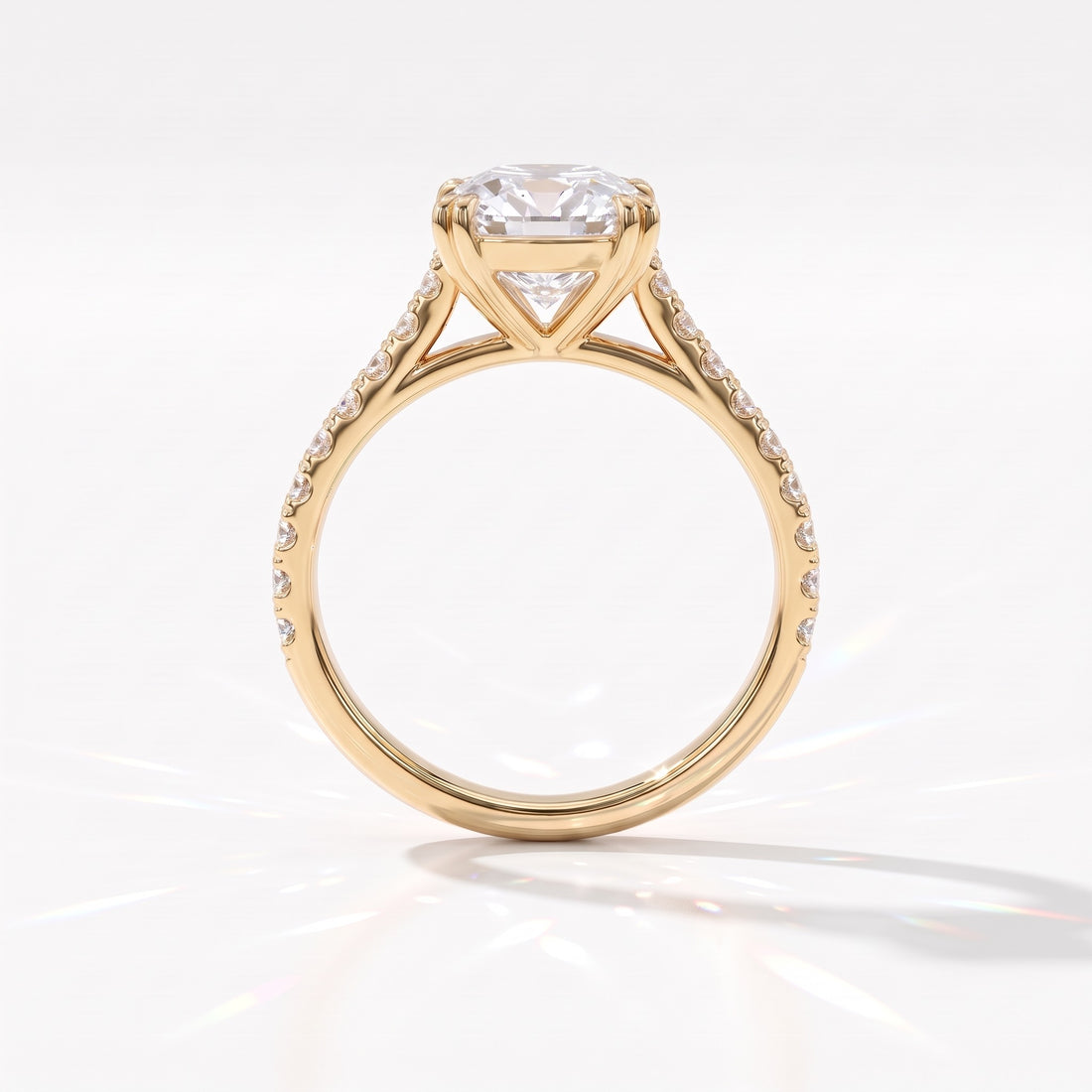 Old mine cushion lab-grown diamond vintage solitaire engagement ring with pavé band in 14K (585) yellow gold, profile view showing the double-claw gallery 