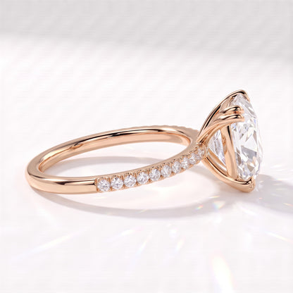 Old mine cushion lab-grown diamond vintage solitaire engagement ring with pavé band in 18K (750) rose gold, side view showing the pavé band 