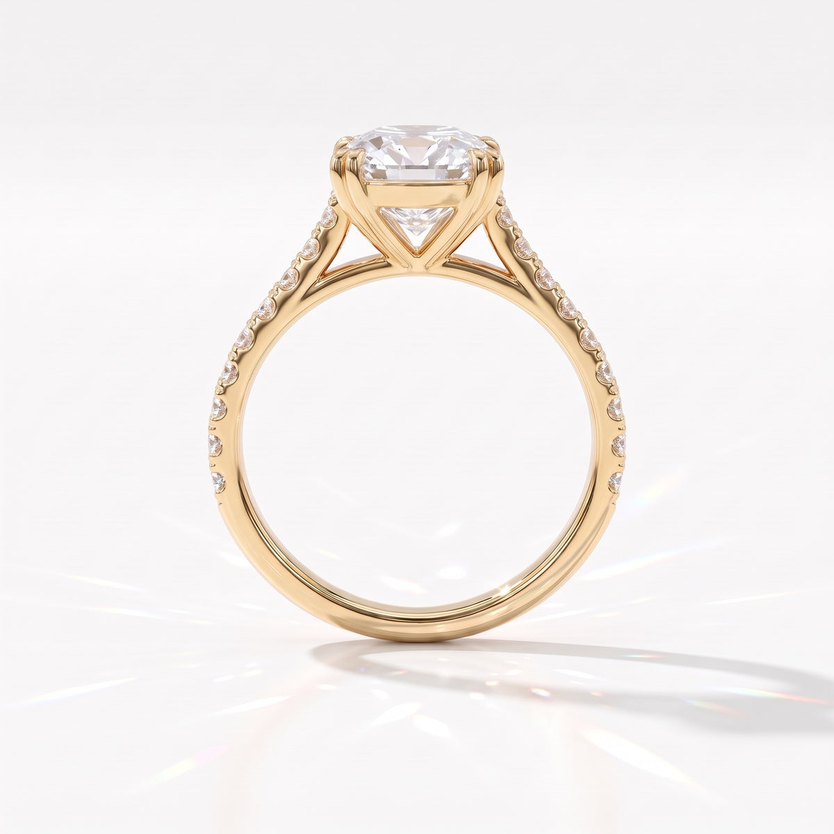 Old mine cushion lab-grown diamond vintage solitaire engagement ring with pavé band in 18K (750) yellow gold, profile view showing the double-claw gallery 