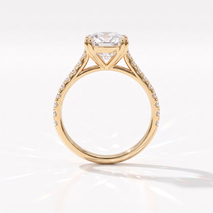 Old mine cushion lab-grown diamond vintage solitaire engagement ring with pavé band in 18K (750) yellow gold, profile view showing the double-claw gallery 