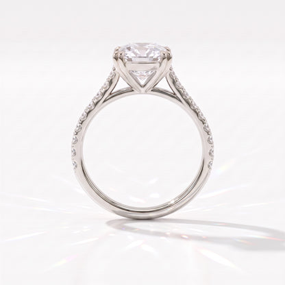 Old mine cushion lab-grown diamond vintage solitaire engagement ring with pavé band in 950 platinum, profile view showing the double-claw gallery 