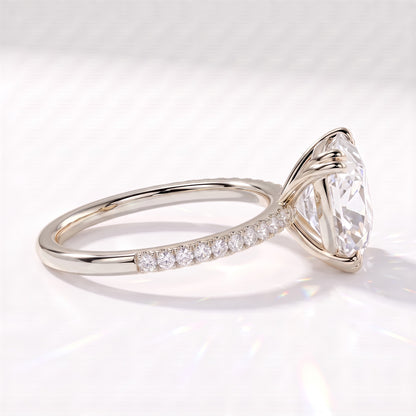 Old mine cushion lab-grown diamond vintage solitaire engagement ring with pavé band in 950 platinum, side view showing the pavé band 