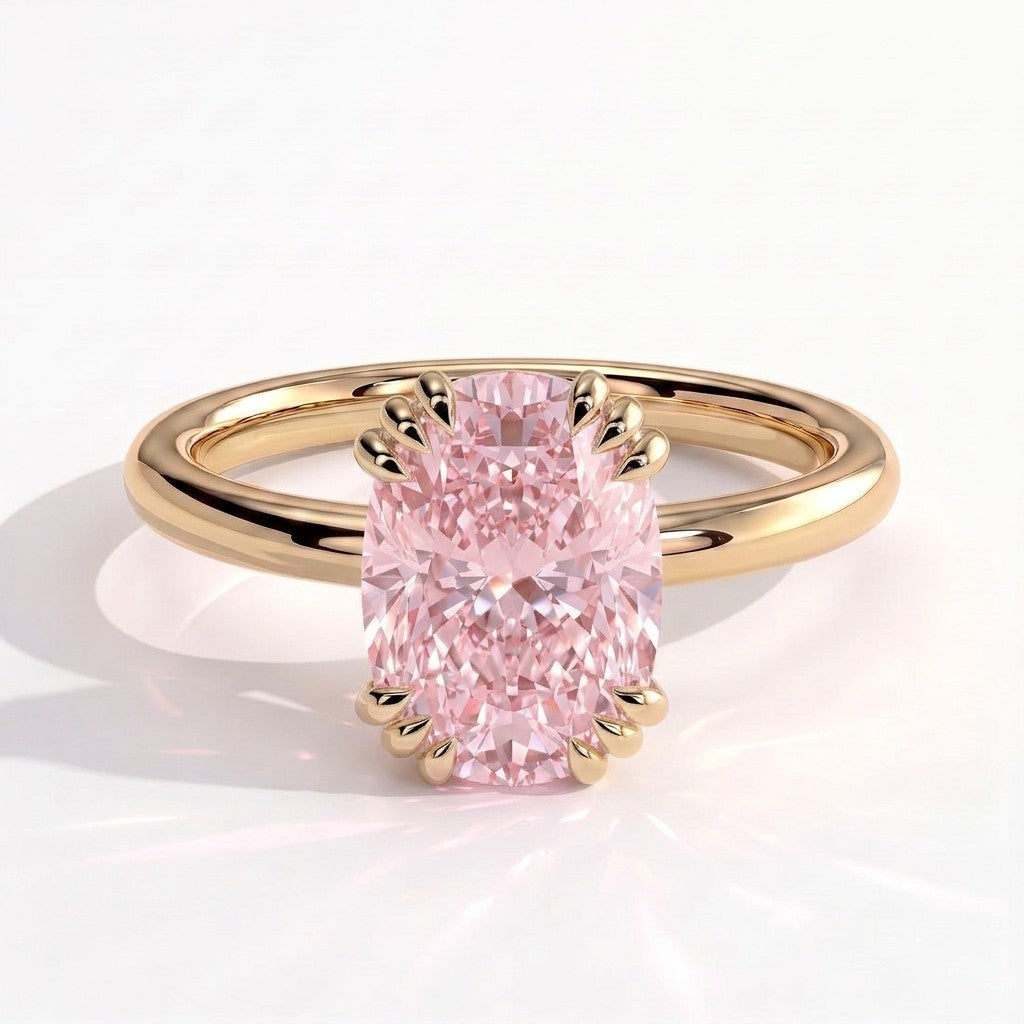 Fancy Vivid Pink elongated cushion lab-grown diamond solitaire engagement ring with triple claw prongs in 14K (585) yellow gold, front view 