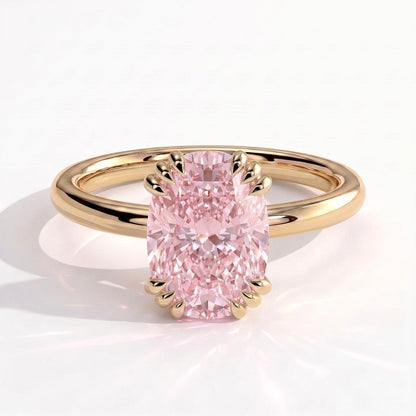 Fancy Vivid Pink elongated cushion lab-grown diamond solitaire engagement ring with triple claw prongs in 14K (585) yellow gold, front view 