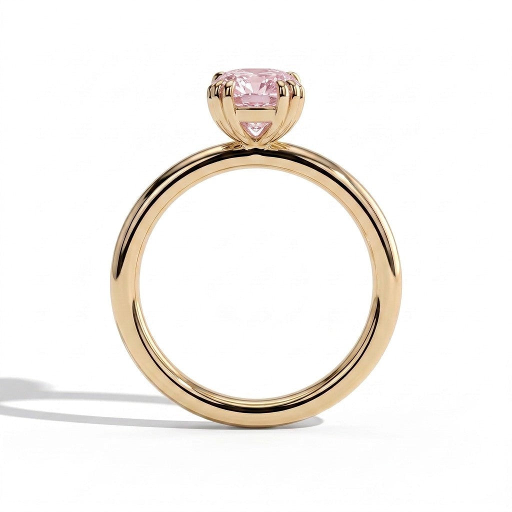 Fancy Vivid Pink elongated cushion lab-grown diamond solitaire engagement ring with triple claw prongs in 14K (585) yellow gold, side profile 