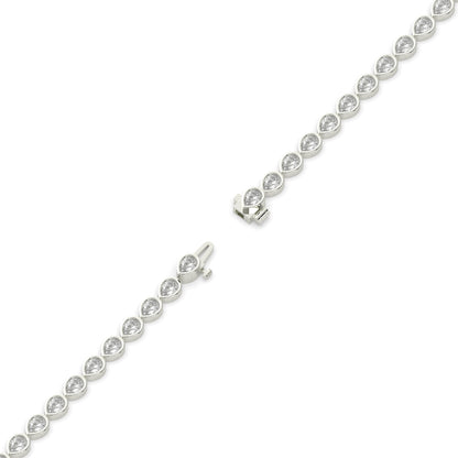 Rina Tennisarmband mit Labordiamanten im Tropfenschliff mit Zargenfassung aus 585 Weißgold, volle Länge, Diagonalansicht 