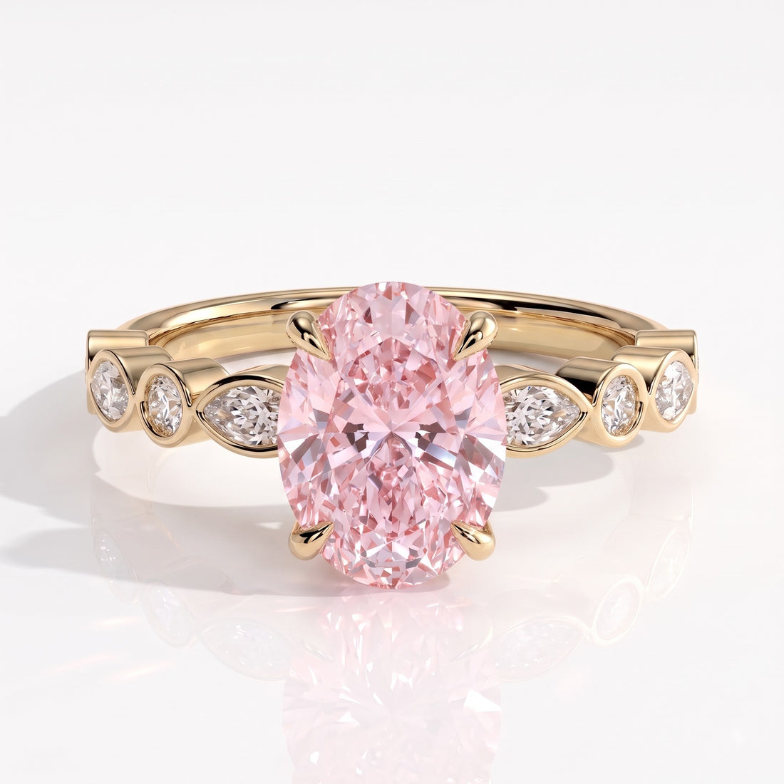 Fancy Vivid Pink oval lab-grown diamond engagement ring with bezel-set pear and round shoulder accents in 14K (585) yellow gold, front view 
