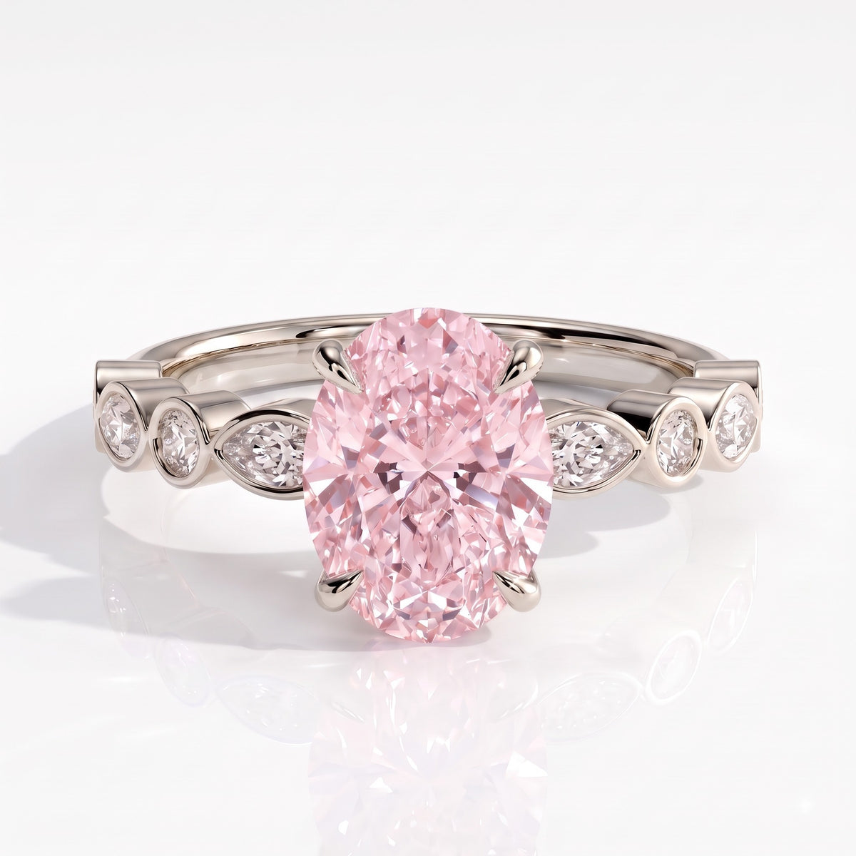 Fancy Vivid Pink oval lab-grown diamond engagement ring with bezel-set pear and round shoulder accents in 18K (750) white gold, front view 