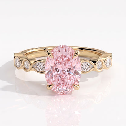Fancy Vivid Pink oval lab-grown diamond engagement ring with bezel-set pear and round shoulder accents in 18K (750) yellow gold, front view 