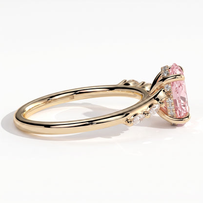 Fancy Vivid Pink oval lab-grown diamond hidden halo engagement ring with marquise accents in 14K (585) yellow gold, detail view of the marquise accents 